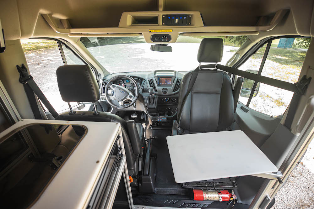 Set up for 2 person seating. The cabin area is open for kitchen modules and other gear.