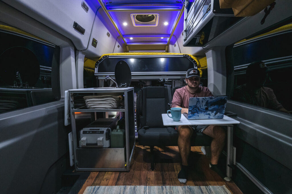 4 person seating using the 2 person bench and kitchen pod. Using lagun pivot as a desk